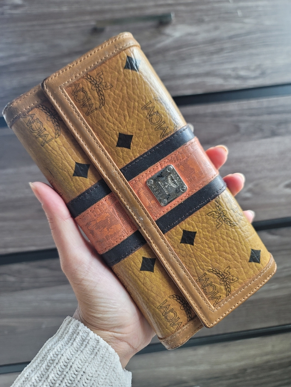 MCM Visetos Coated Canvas and Leather Trifold Wallet.